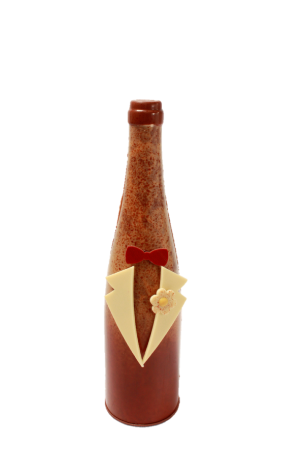 grande bouteille  CHOCOLAT lait  40% côte d'Ivoire garnie de noisettes caramélisées et enrobées de chocolat au lait